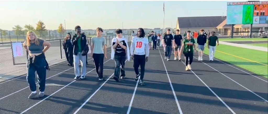 PEHS students and staff walking the track for mental health awareness