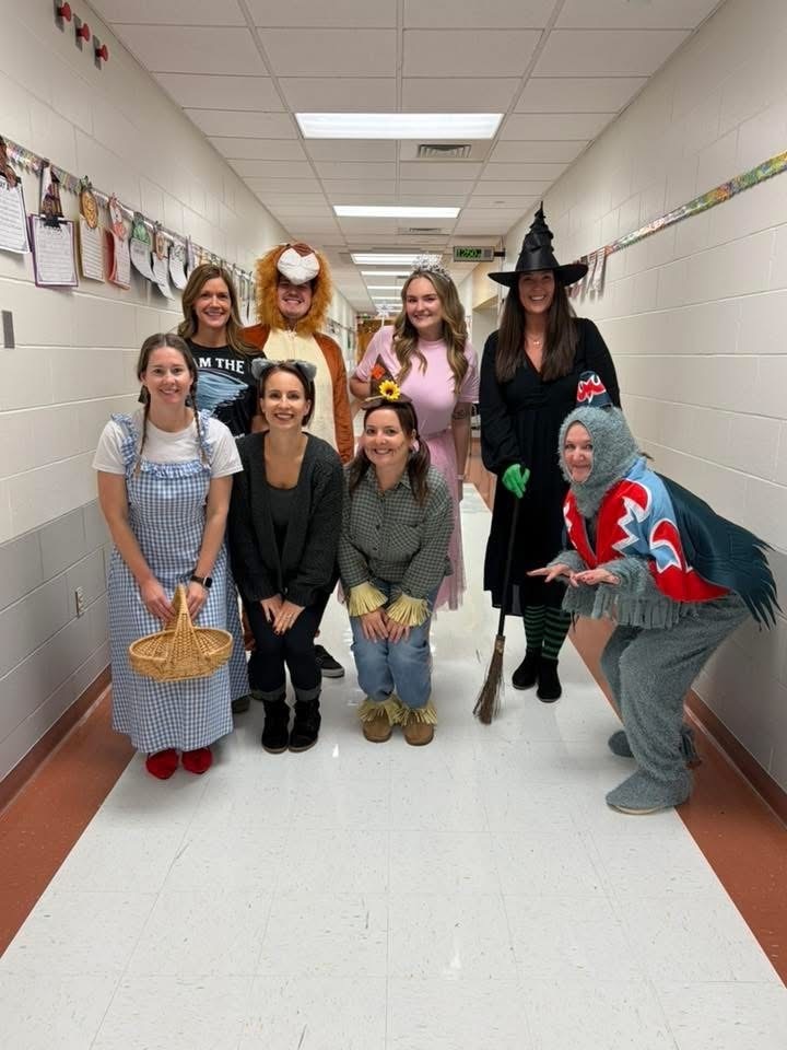 A group of teachers dressed as Wizard of Oz characters.