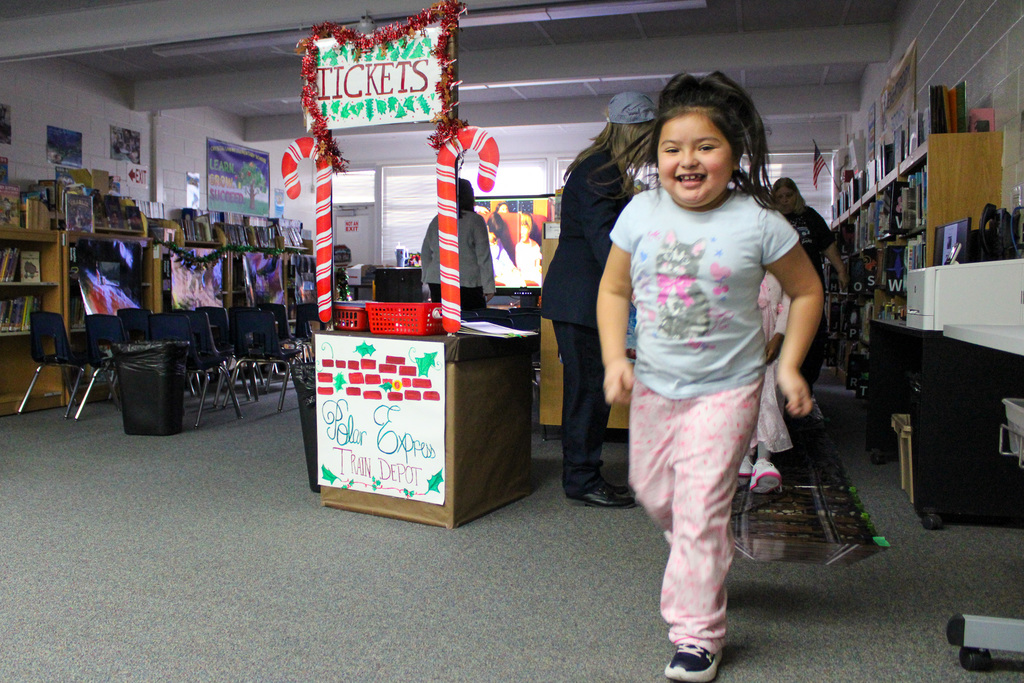 student walks toward camera