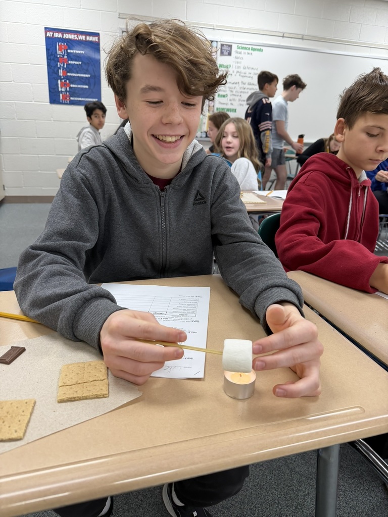 Ira Jones MS students conducting a science activity using s'mores