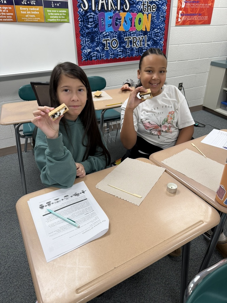 Ira Jones MS students conducting a science activity using s'mores
