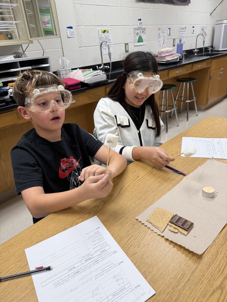 Ira Jones MS students conducting a science activity using s'mores