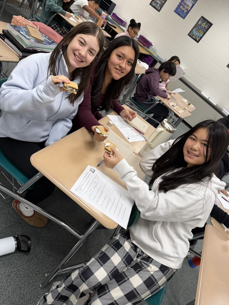 Ira Jones MS students conducting a science activity using s'mores