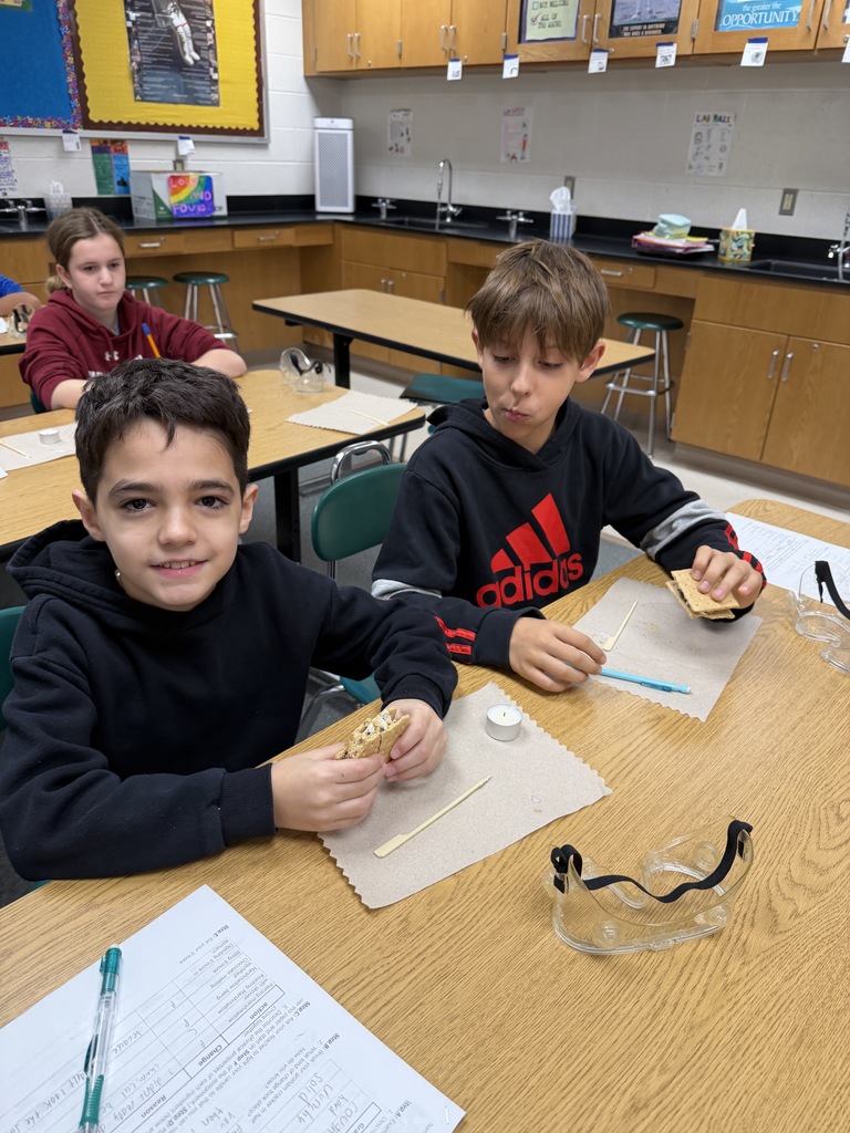 Ira Jones MS students conducting a science activity using s'mores