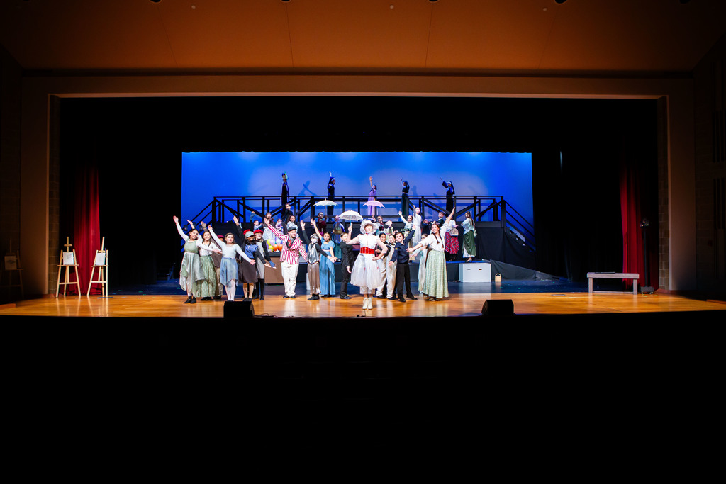 Mary Poppins Jr cast performing on stage