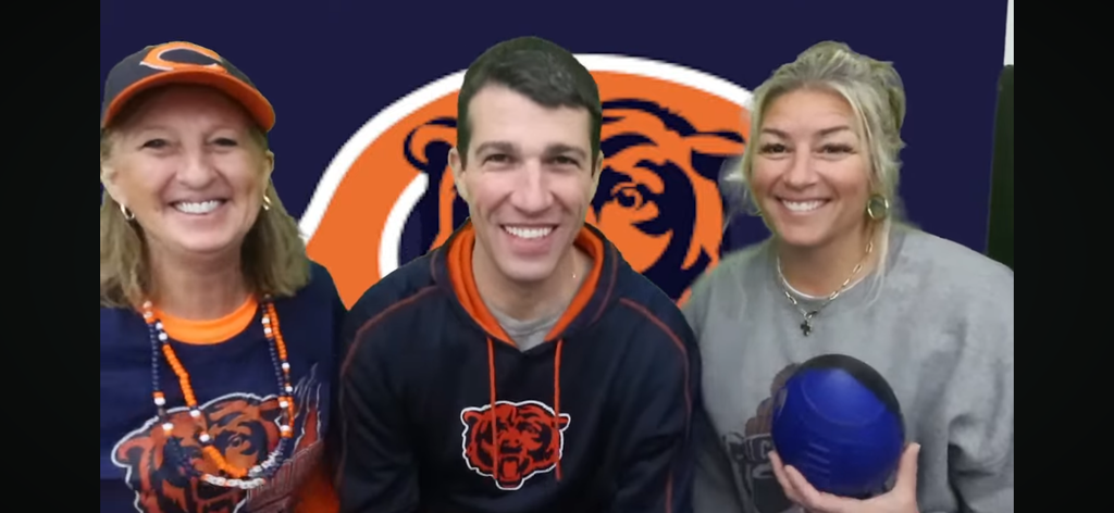 Three teachers wearing Bears clothes.