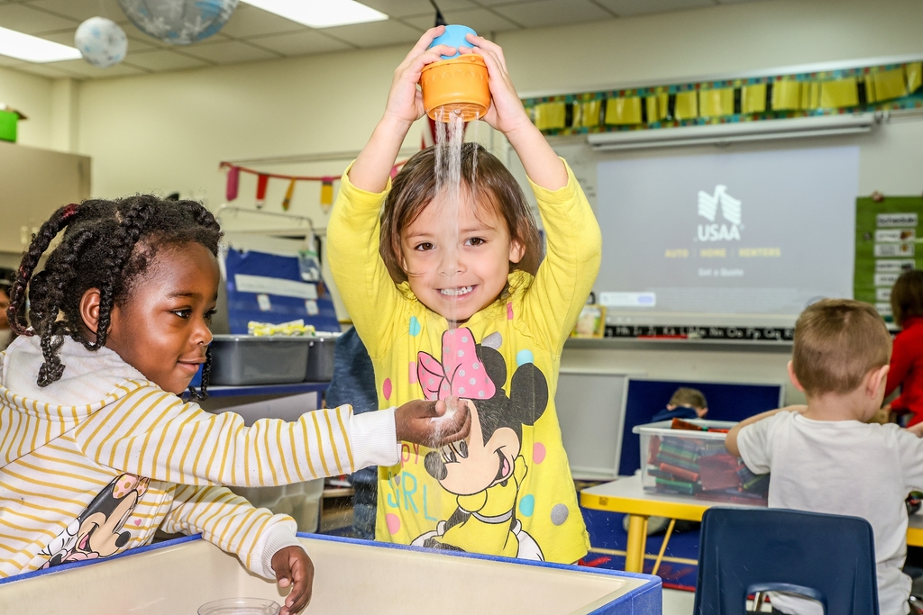 BMLC students play in sand