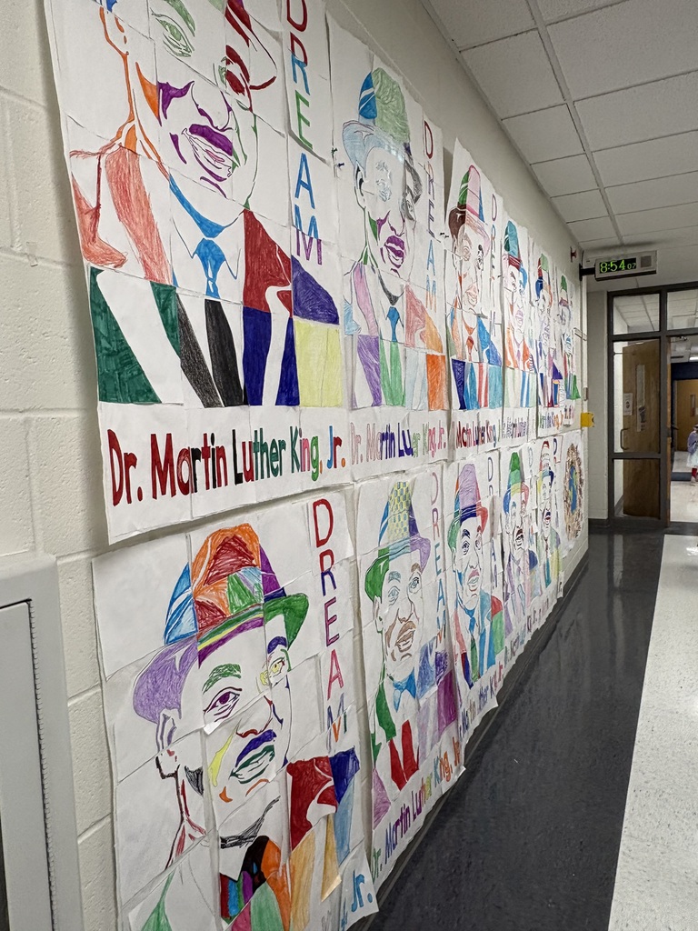 A hallway display of Martin Luther King Jr. collaborative posters. 