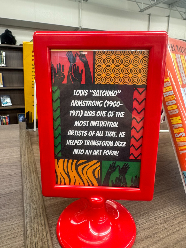 red frame post card with an african background Louis "Satchmo" Armstrong (1900-1971) was one of the most influential artists of all time. he helped transform jazz into an art form