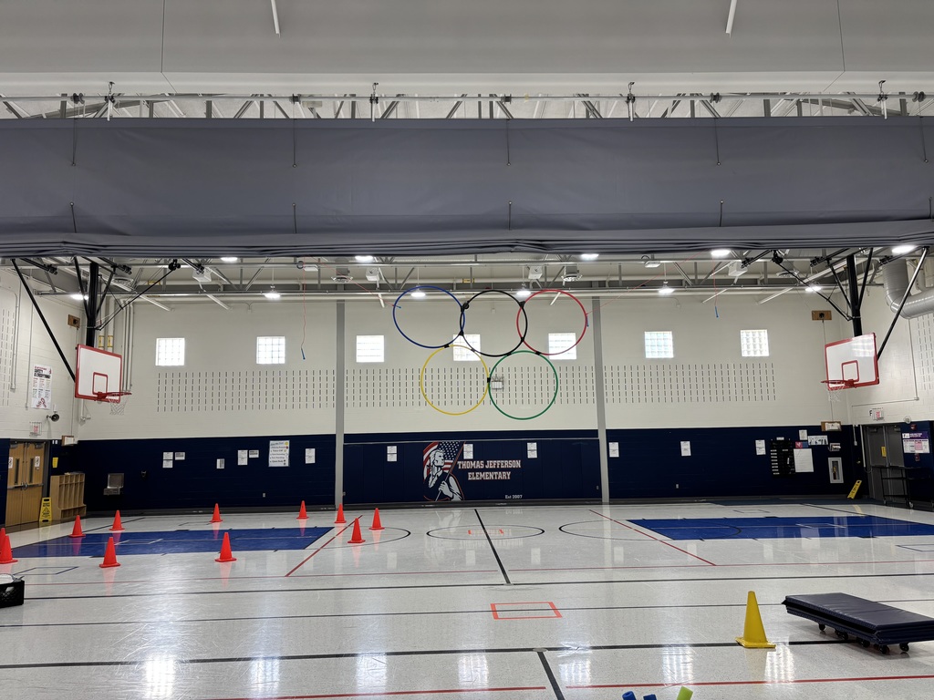 A school gym set up for an Olympic themed event.