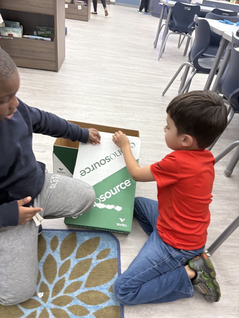Students experiment with clay and rocks to test force and motion. 