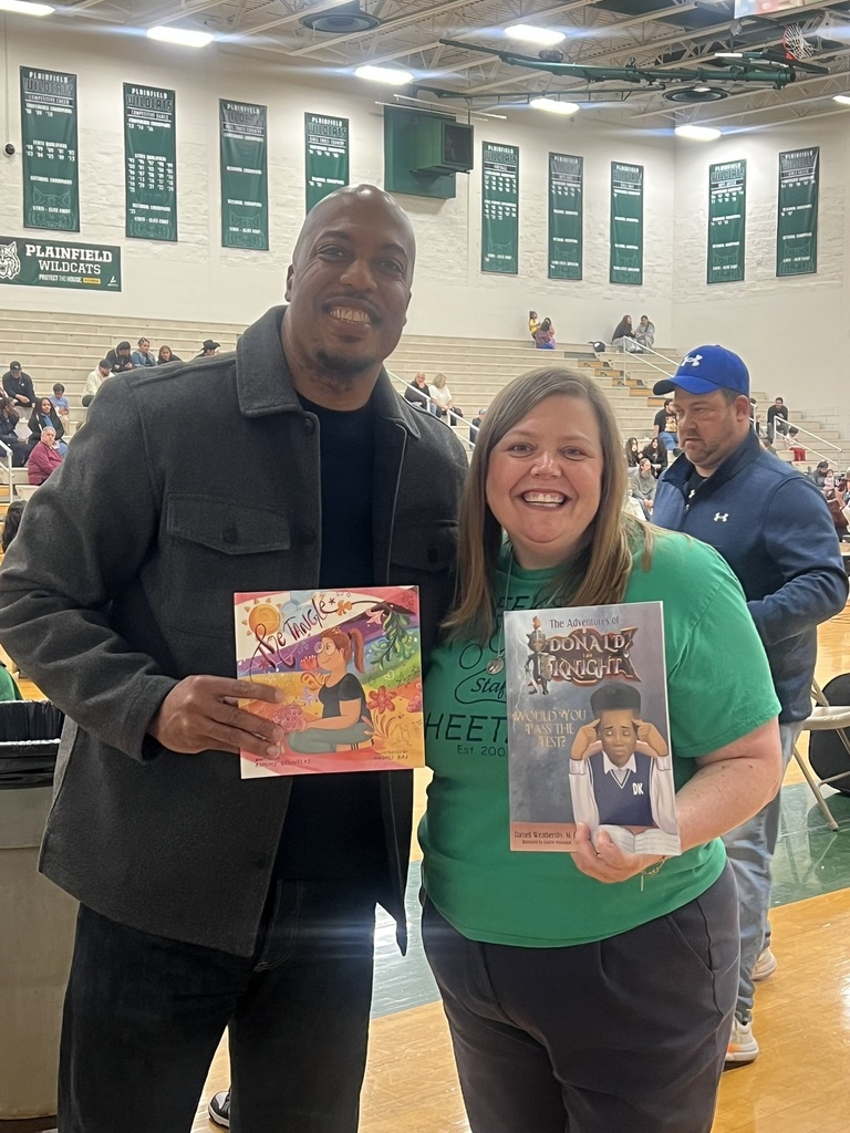 Celebration of Cultures teachers holding their books