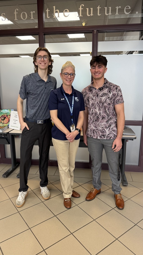 PSHS principal Lisa Smith stands with students Malcolm Henes and Luigi Perri