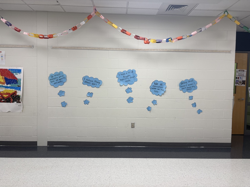 Quote bubbles  in a hallway. 