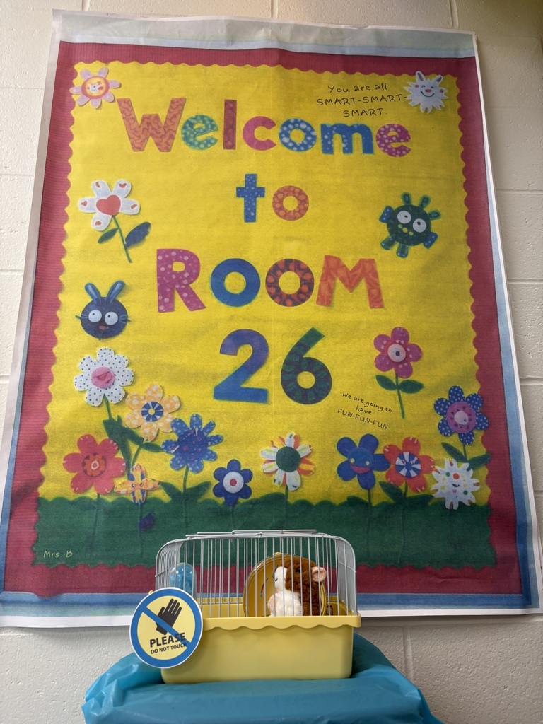 A poster that says  welcome to room 26.