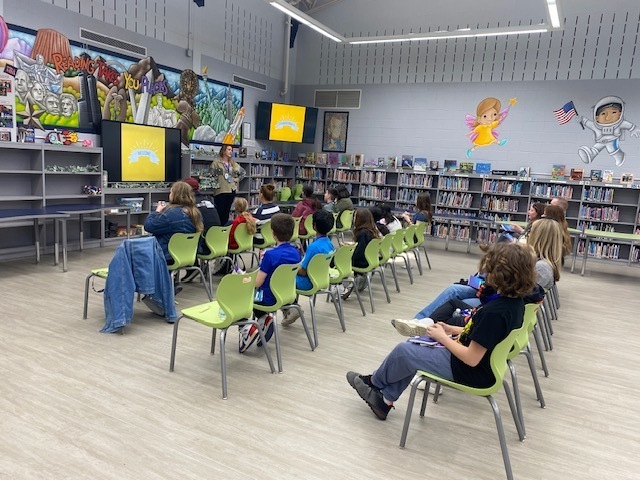 Lincoln ES students in media center for publishers party