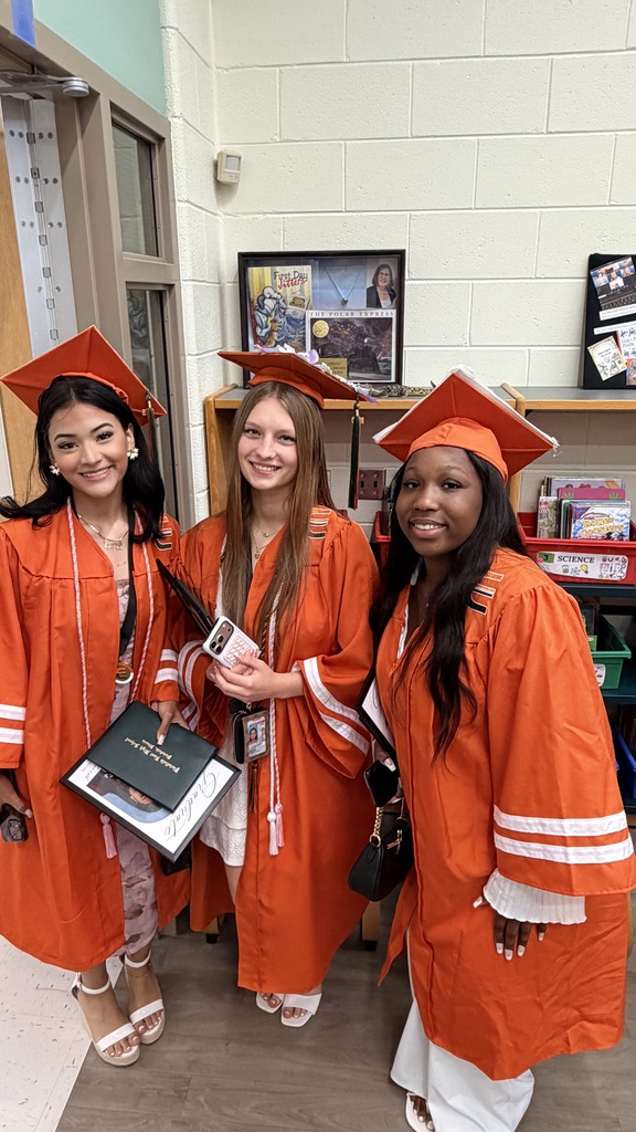 Former Eichelberger ES students walk the halls in their caps and gowns