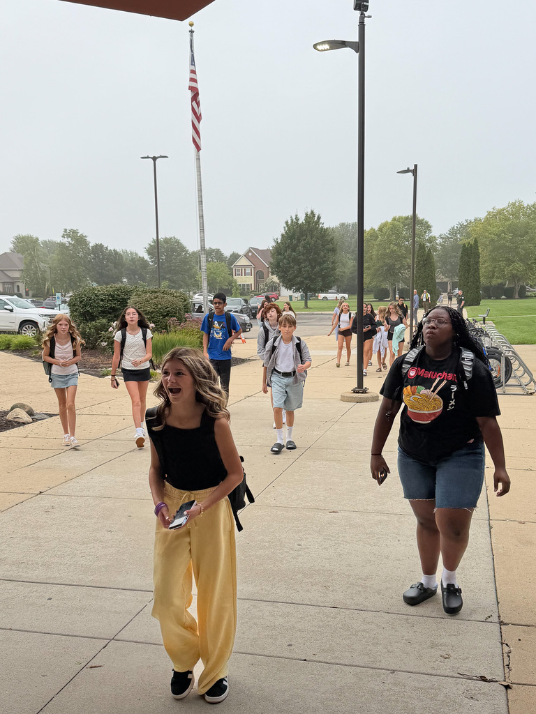 students walking in
