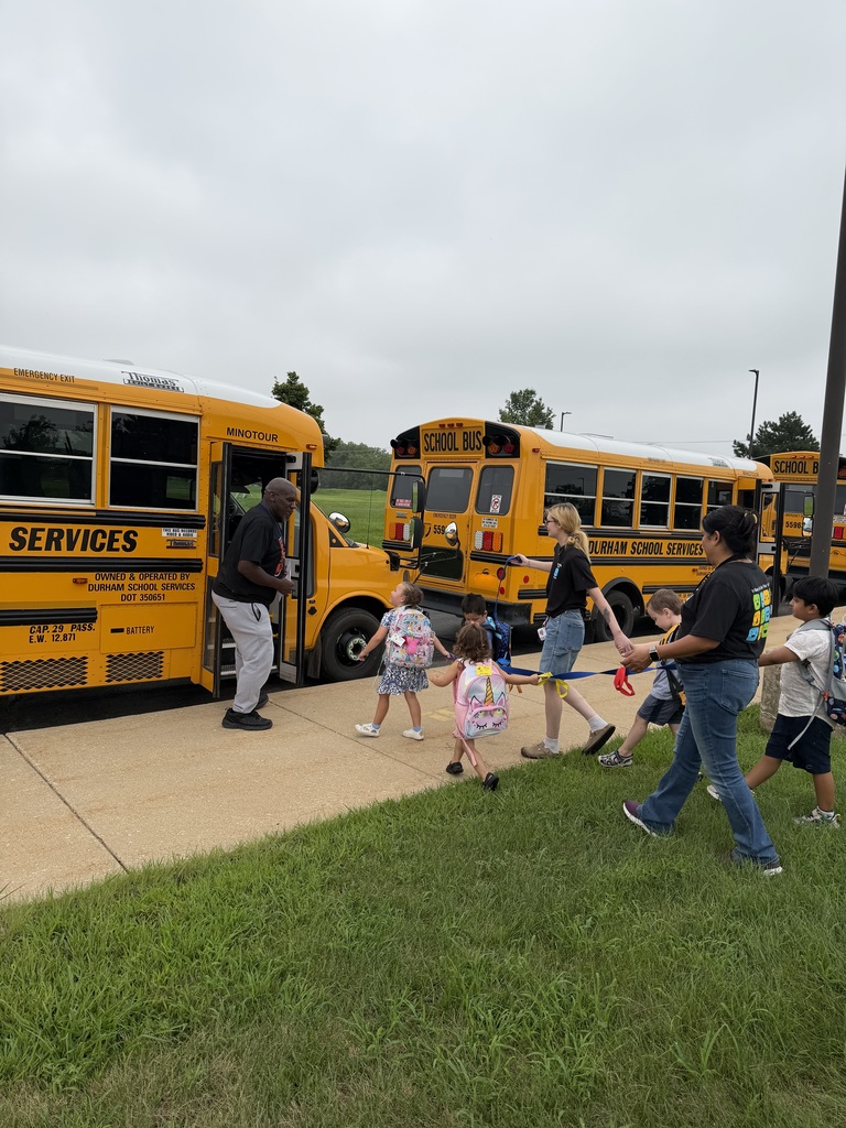 students walking to bus