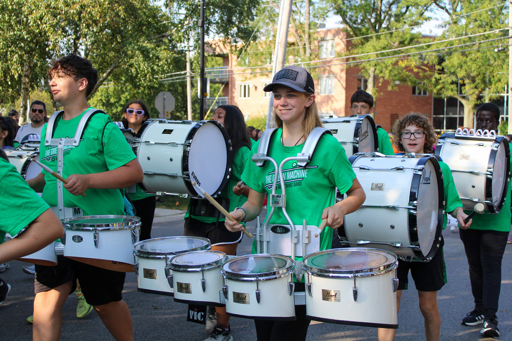 band students marching in 2025 homecoming parade