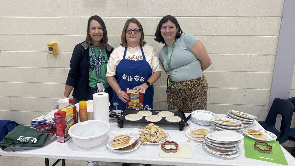 staff serving pancakes
