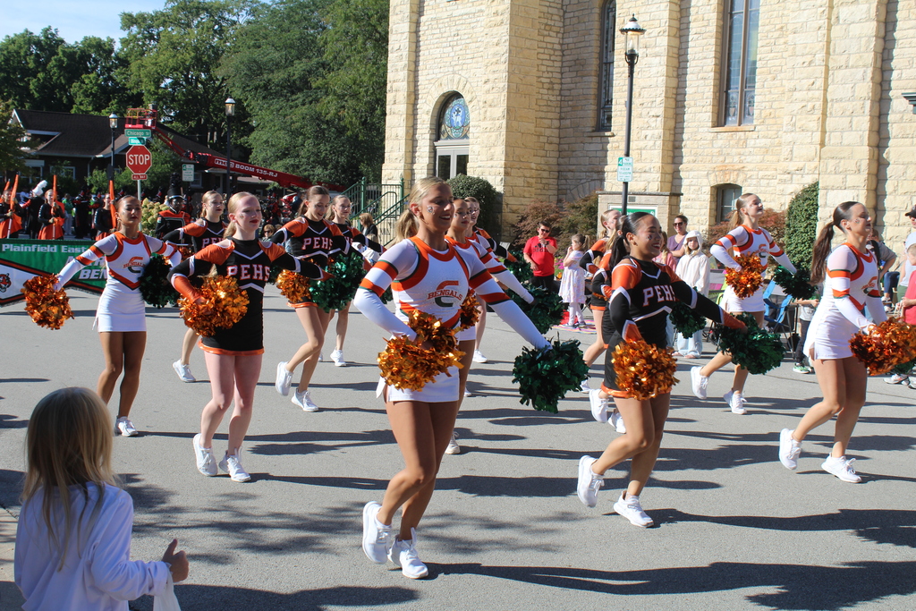 PEHS cheer  marching in the parade