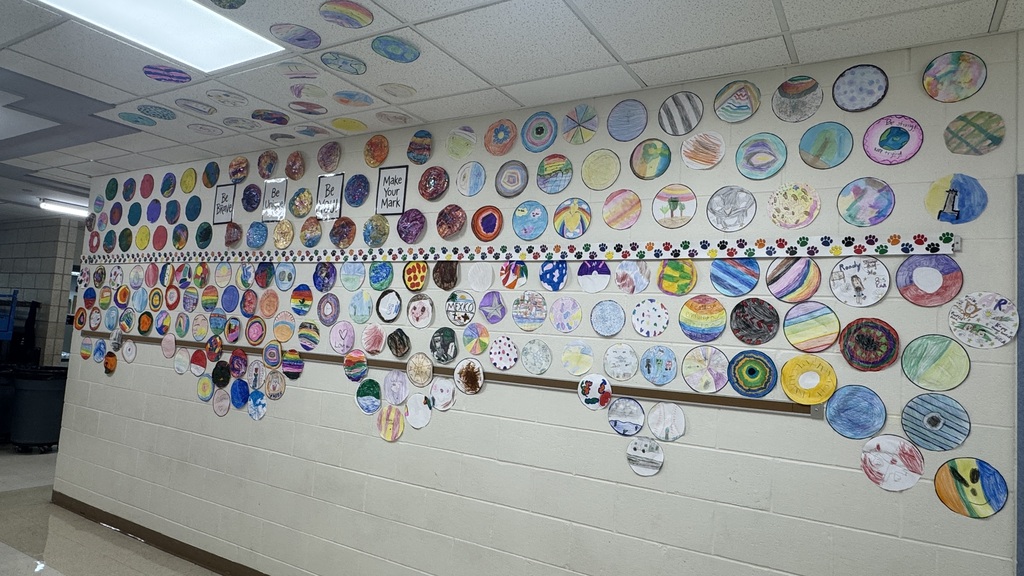 artwork on wall and hallway