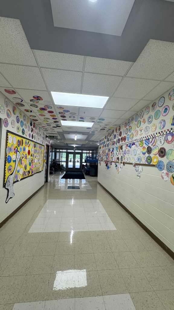 artwork on wall and hallway