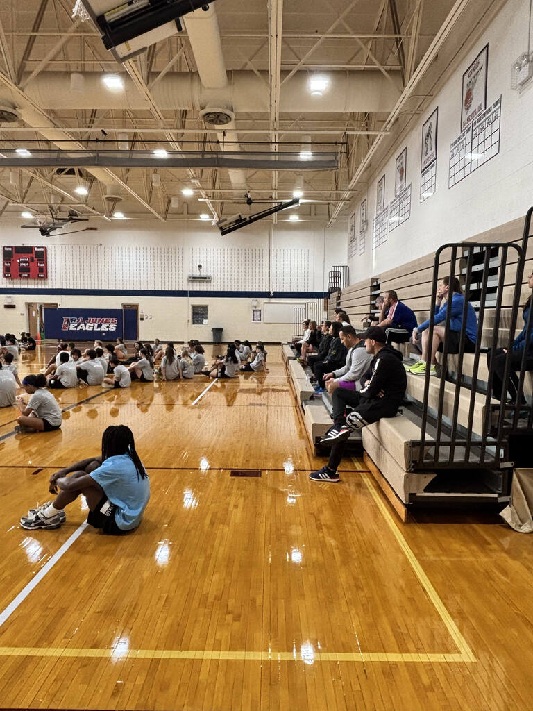 students and parents in gym for Eagle Dash