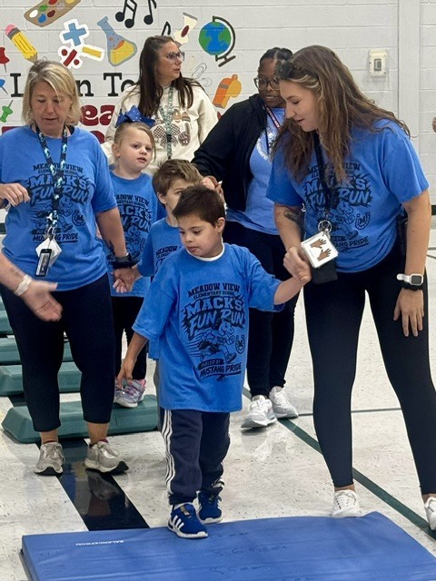 Meadow View ES students inside at the fun run