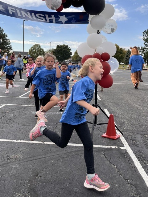 Meadow View ES students outside at the fun run