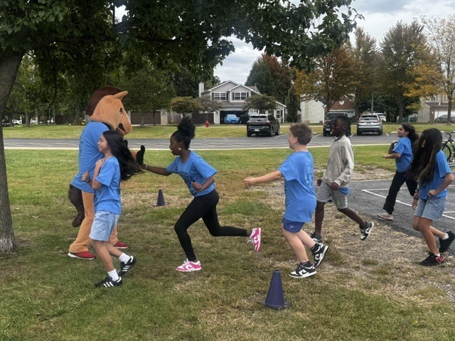 Meadow View ES students outside at the fun run