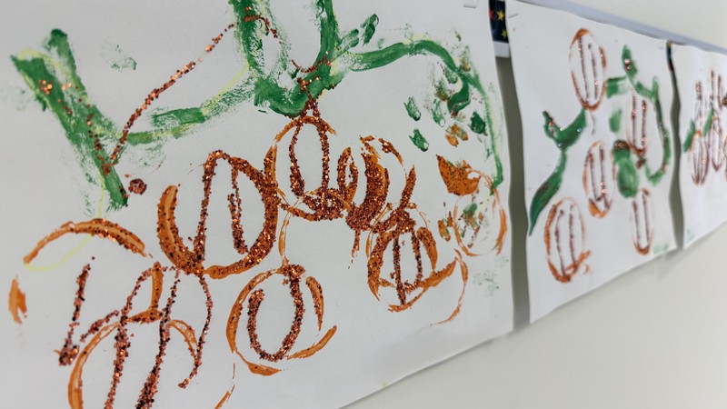 Fall themed artwork on display in BMLC hallway.