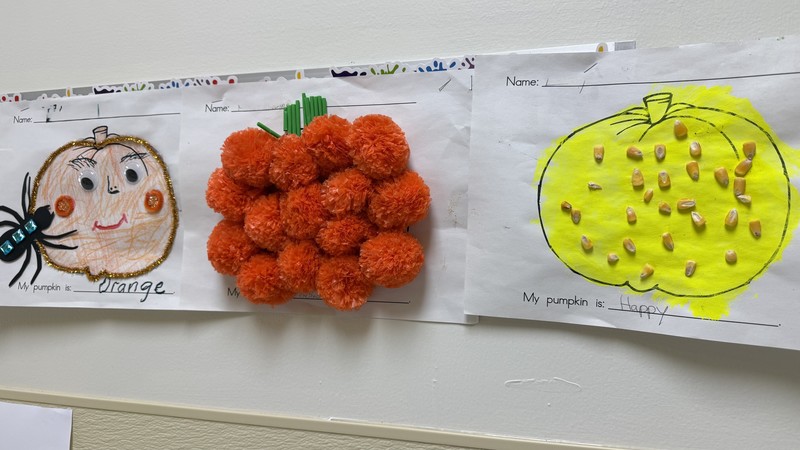 Fall themed artwork on display in BMLC hallway.