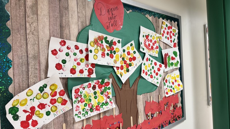 Fall themed artwork on display in BMLC hallway.