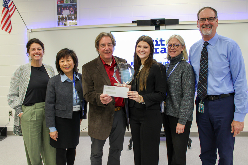 group of people stand together