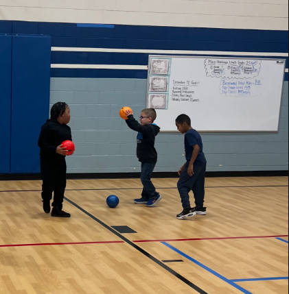 Students playing basketball