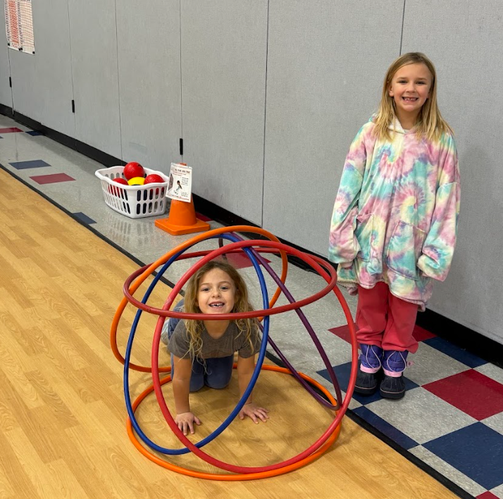 Girls playing with hulahoops