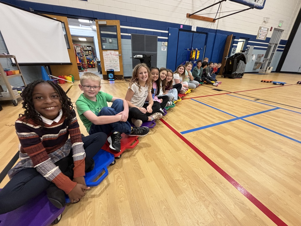 Students playing with scooters