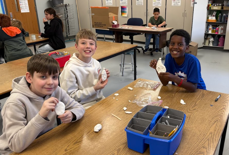 Students making ornaments in art class