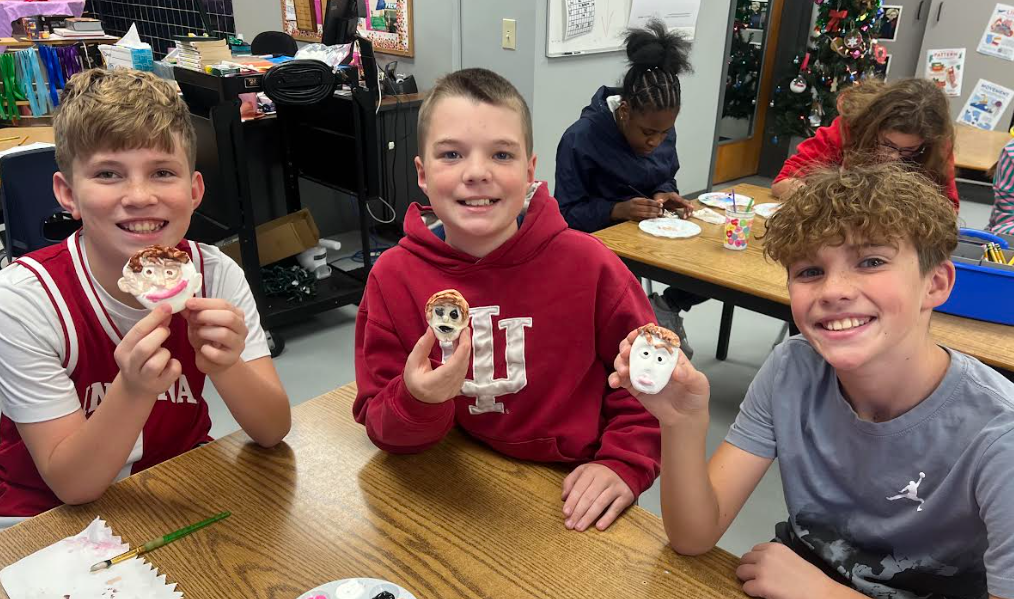 Students making ornaments in art class