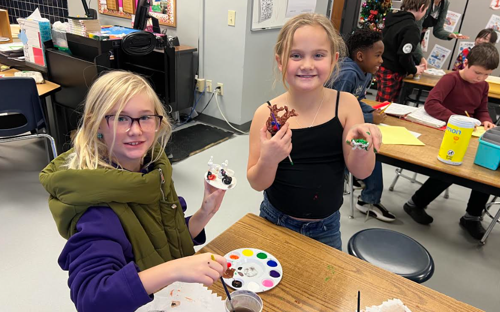 Students making ornaments in art class