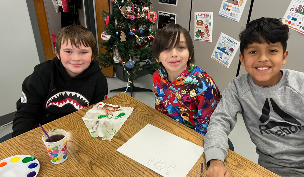 Students making ornaments in art class