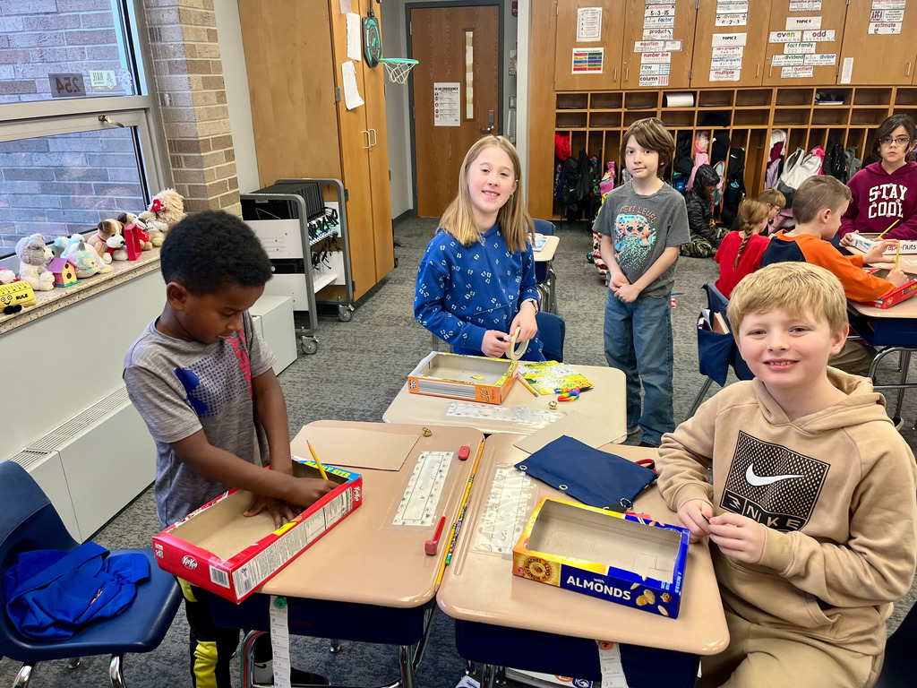 3rd grade students working on jingle bell mazes