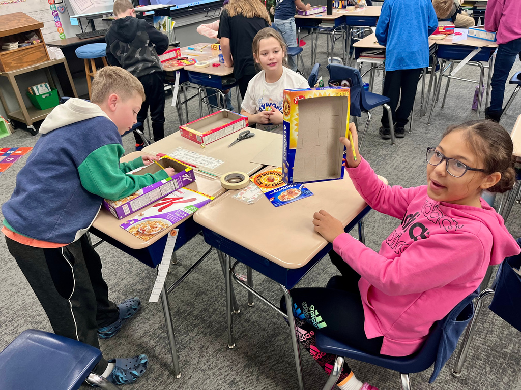 3rd grade students working on jingle bell mazes