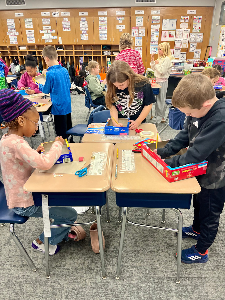 3rd grade students working on jingle bell mazes