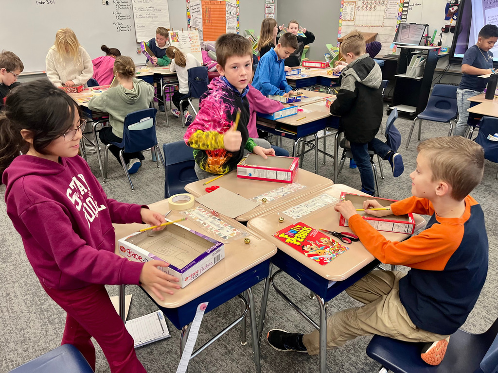 3rd grade students working on jingle bell mazes
