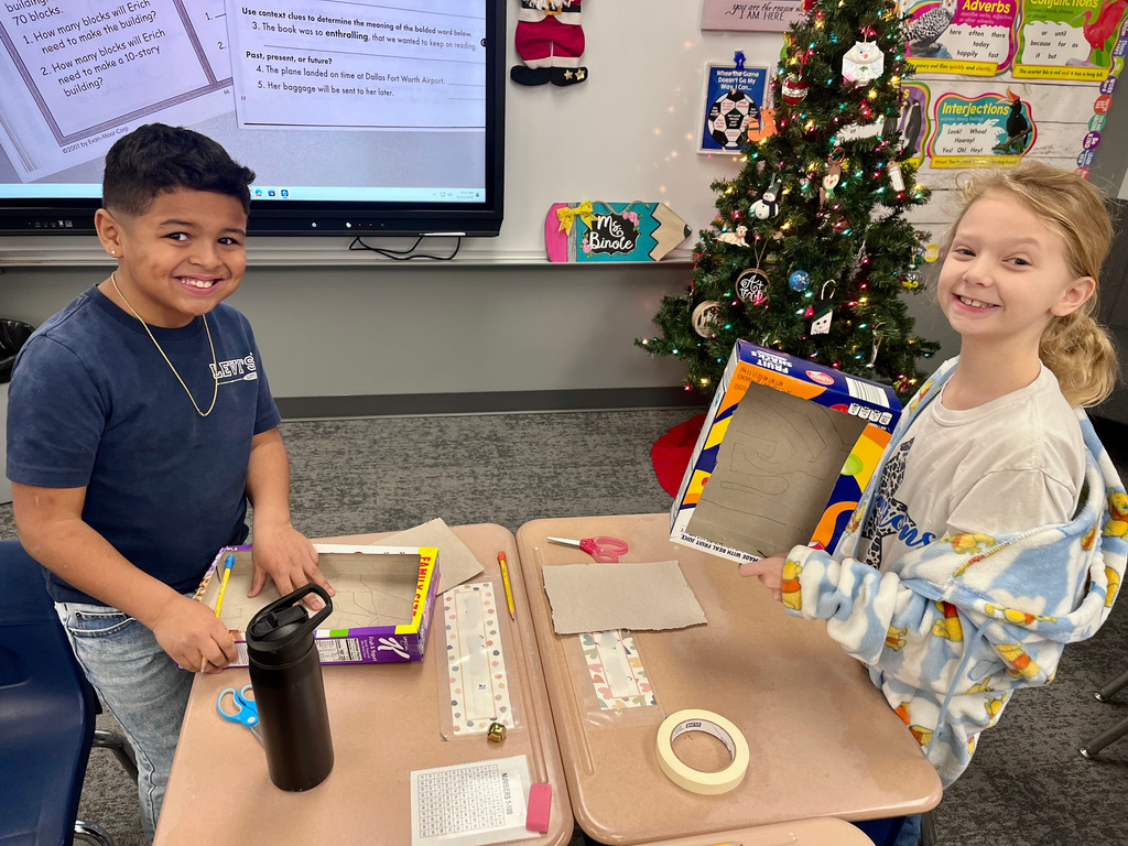 3rd grade students working on jingle bell mazes