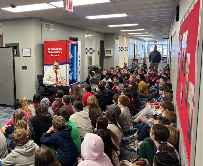 Rotary club sharing about book vending machine