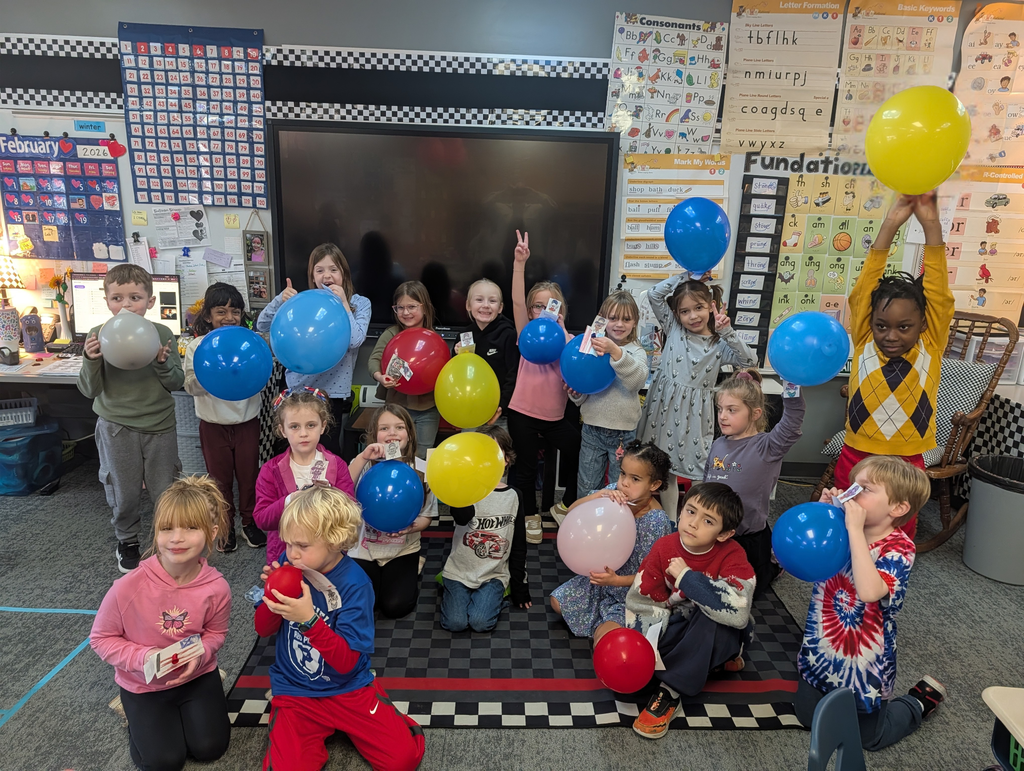 Students making hoverboards powered by balloons for the tooth fairy